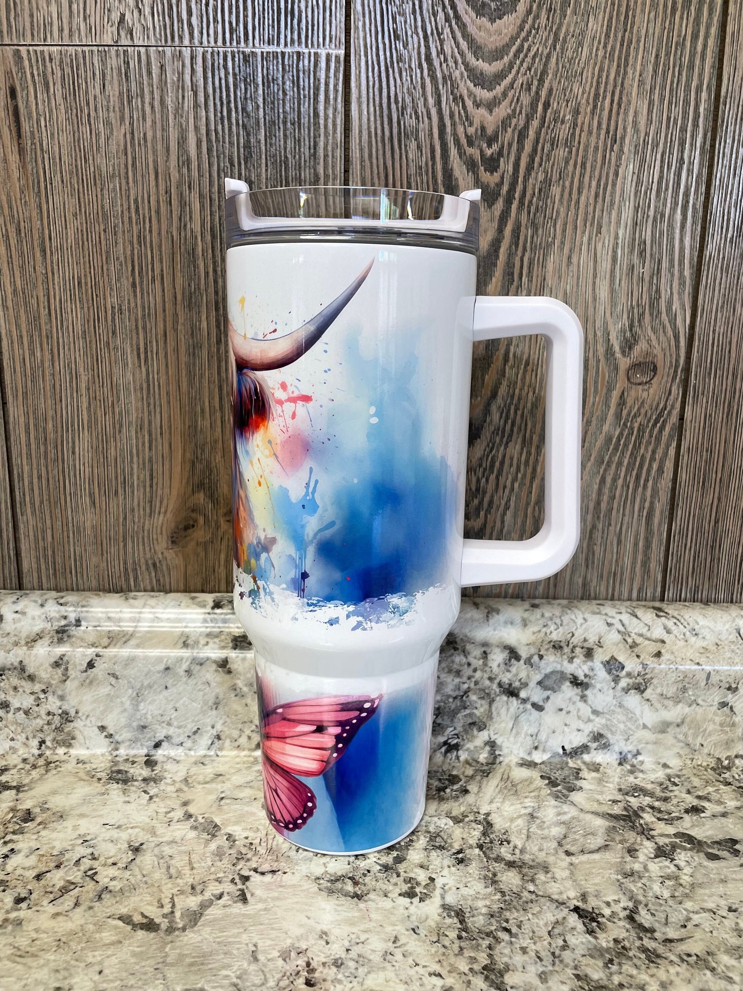 Highlander Cow Butterfly Watercolor 40 ounce Stainless Tumbler with Handle